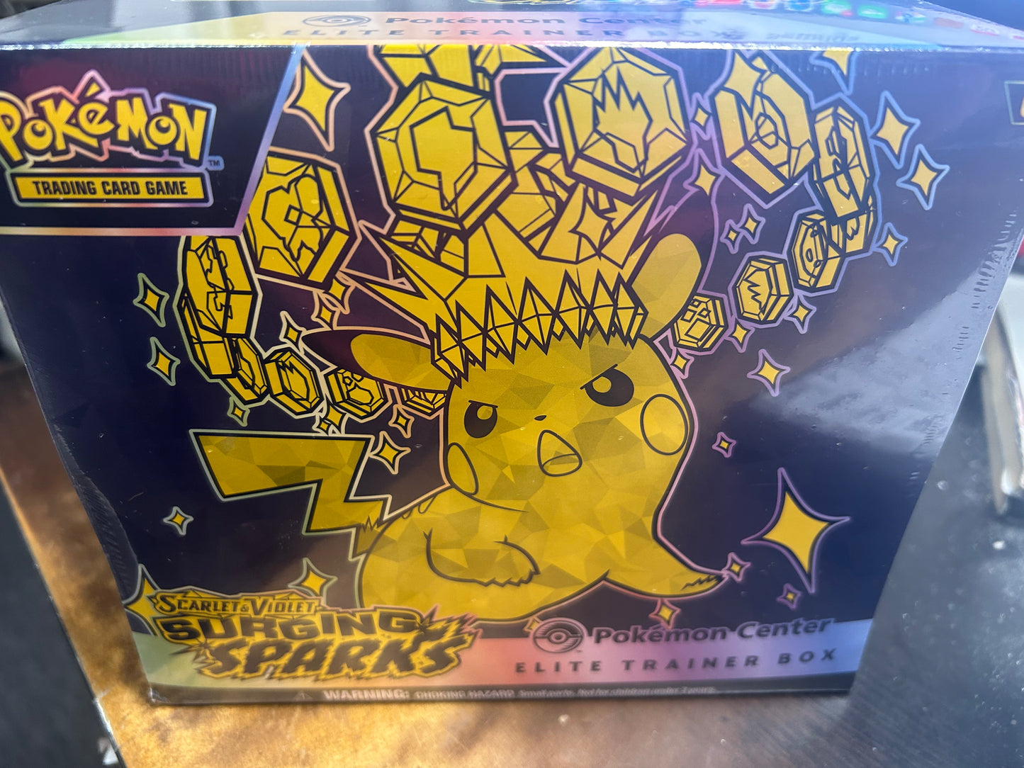 SURGING SPARKS POKEMON CENTER ELITE TRAINER BOX