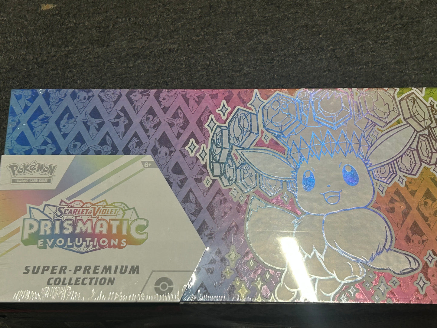PRISMATIC EVOLUTIONS SUPER PREMIUM COLLECTION.   DAILY DEAL