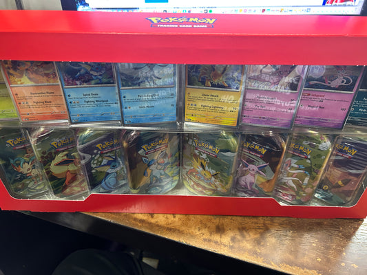 PRISMATIC EVOLUTION 8 MINI TIN BUNDLE W/PROMO'S.  16 PACKS