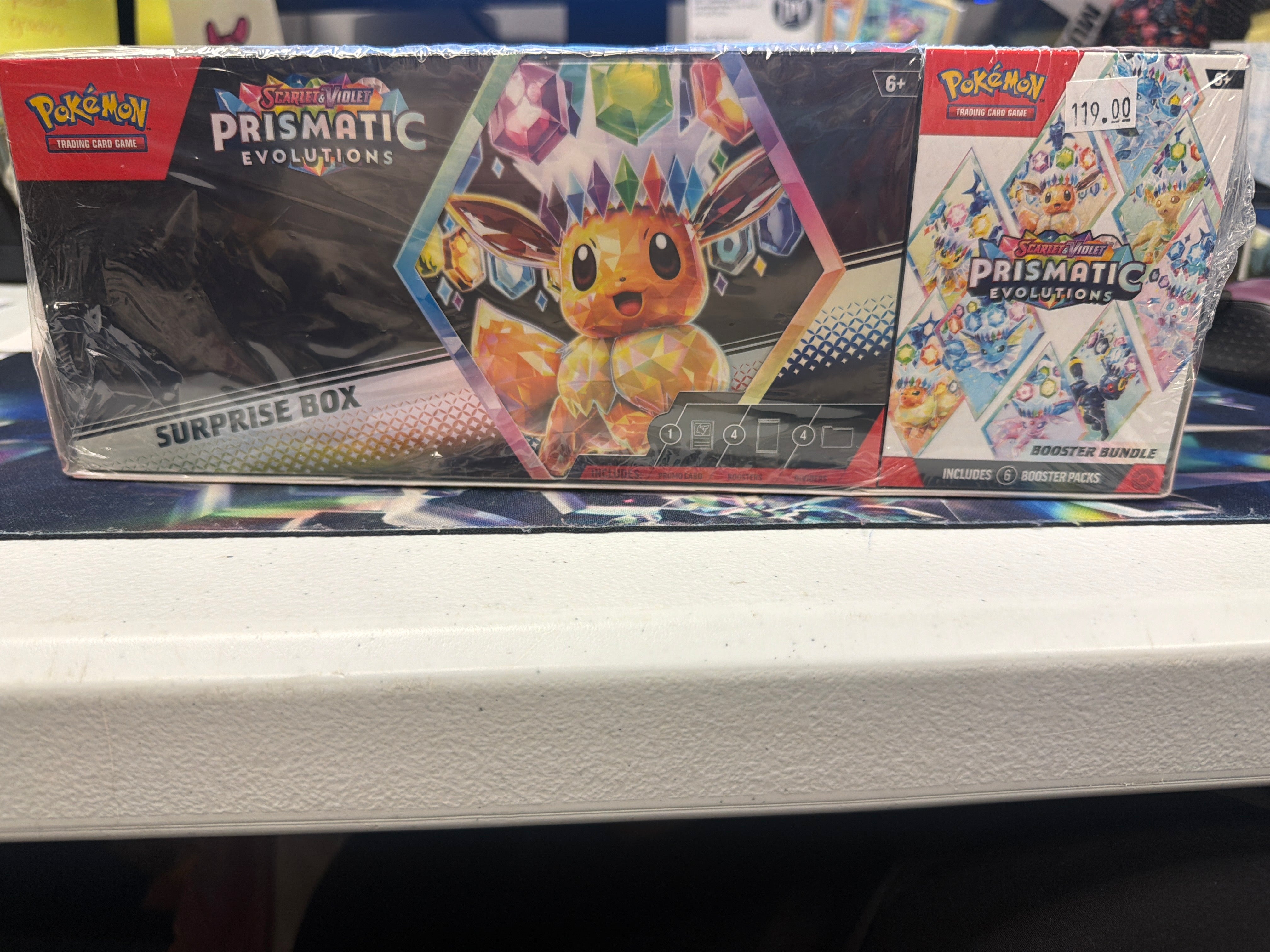 PRISMATIC SURPRISE BOX/ BOOSTER BUNDLE COMBO. – TPV POKE CENTER