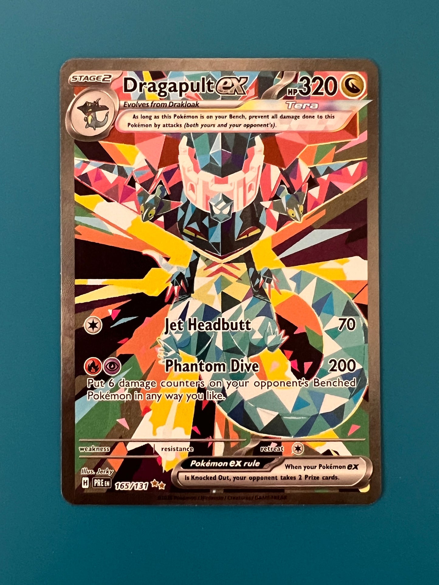 DRAGAPULT 165/131 PRISMATIC EVOLUTIONS PK1207 UNGRADED
